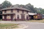 Warren & Ouchita Valley depot with Rock Island caboose.